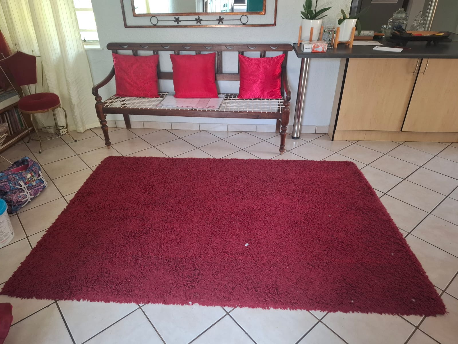 A fresh red rug photographed during an Estlas job
